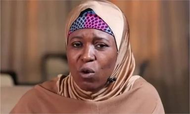 Aisha Yesufu speaking during a political meeting where she raised concerns about the FCT senatorial primary process in Nigeria.