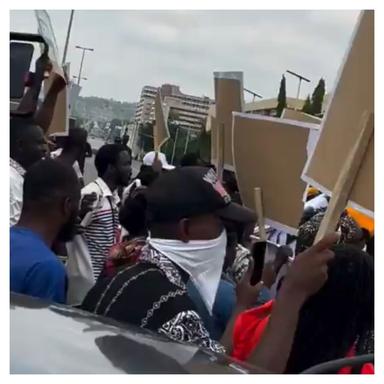 Protesting Nigerians marching in Abuja with placards calling for the rescue of abducted schoolchildren in Oyo State and stronger government action on insecurity.